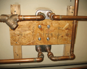 Heat exchanger mounted and plumbed